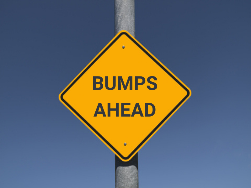 Traffic sign stating "bumps ahead"